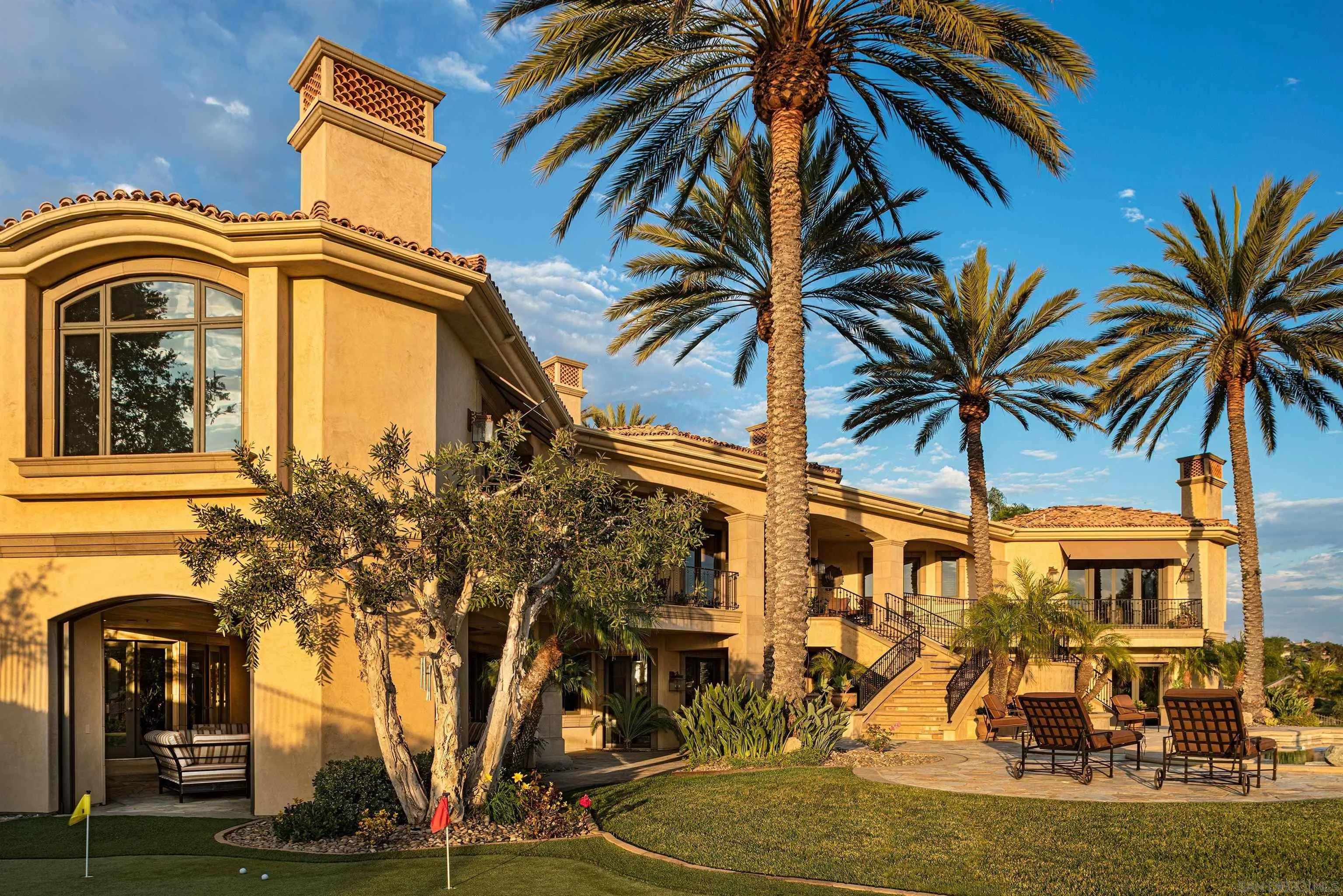 7756 St Andrews Road Rancho Santa Fe, CA 92067 - Photo 68 of 68 a front view of a house with a garden