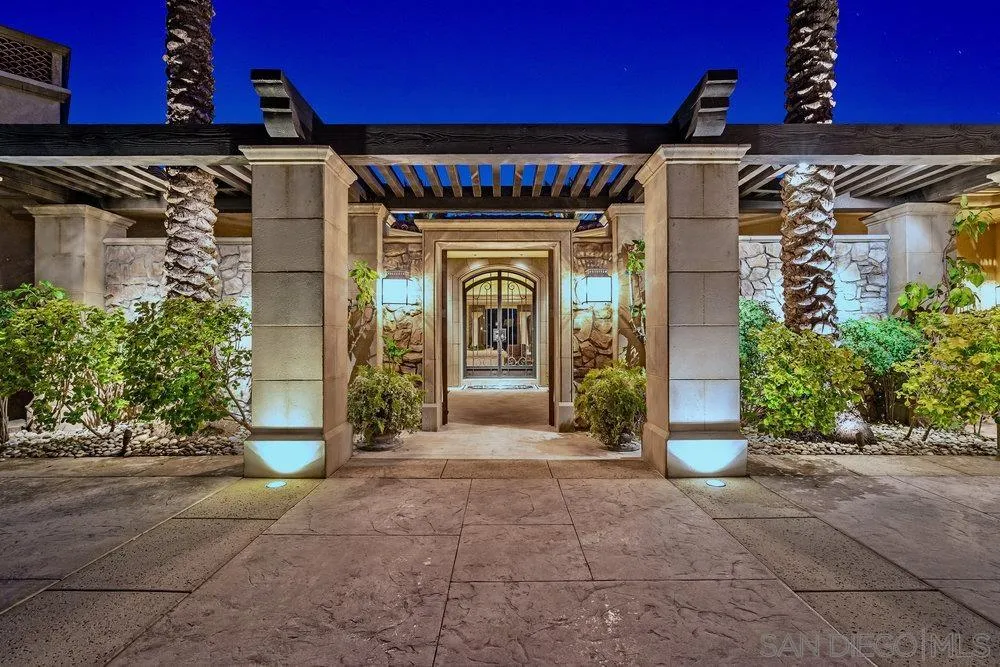 7756 St Andrews Road Rancho Santa Fe, CA 92067 - Photo 10 of 68 a front view of a house with garden