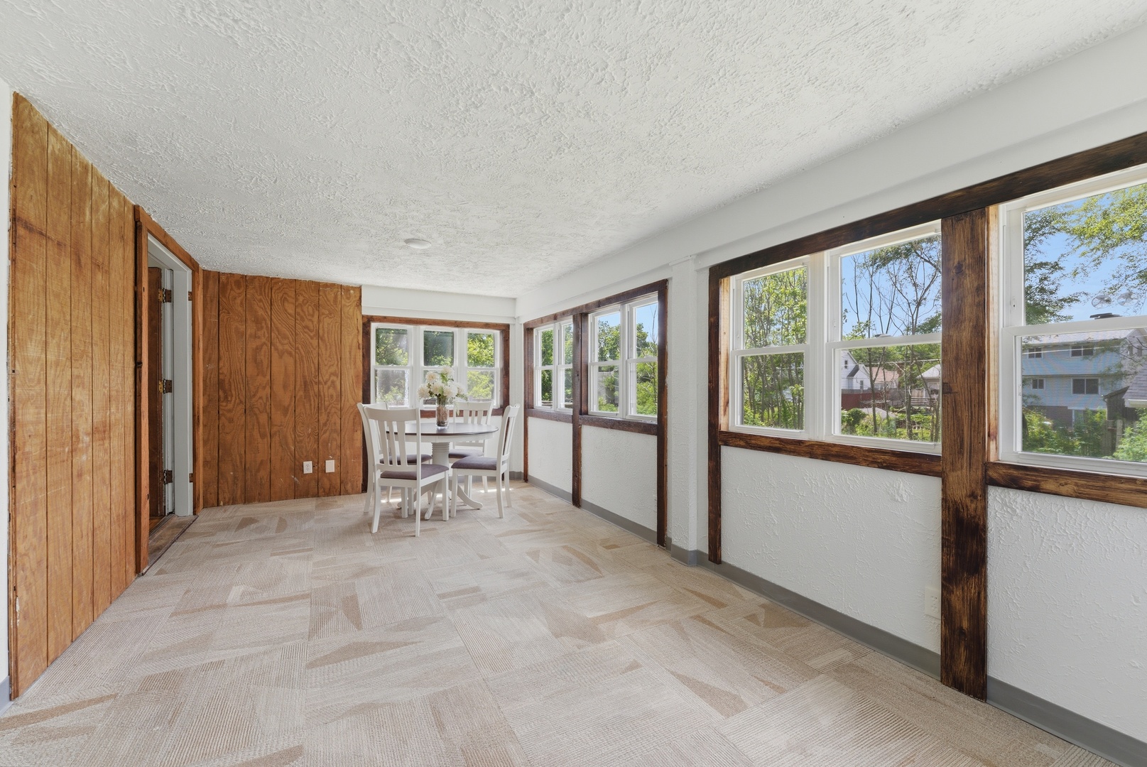 2405 31st Street Moline, IL 61265 - Photo 8 of 24 a view of an empty room with furniture and a window