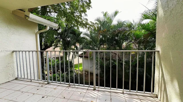 a view of a balcony with lake view