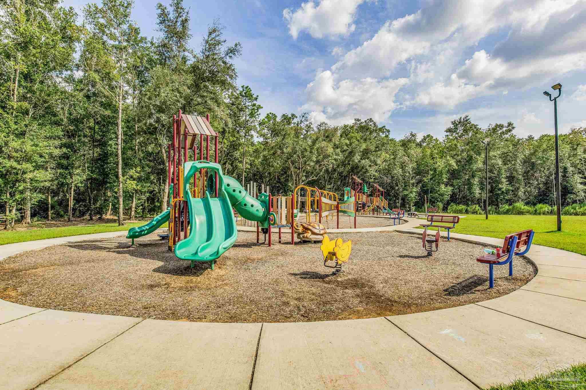 4413 White Birch Court Pace, FL 32571 - Photo 20 of 21 a view of a park with slide