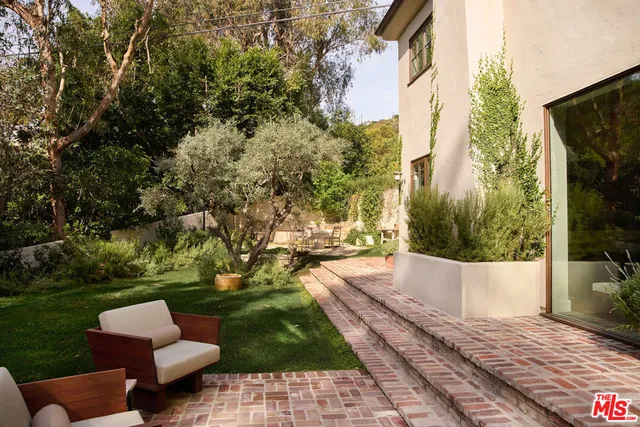 a view of yard from outdoor seating