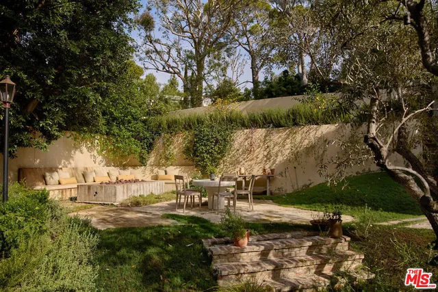 a garden view with sitting space