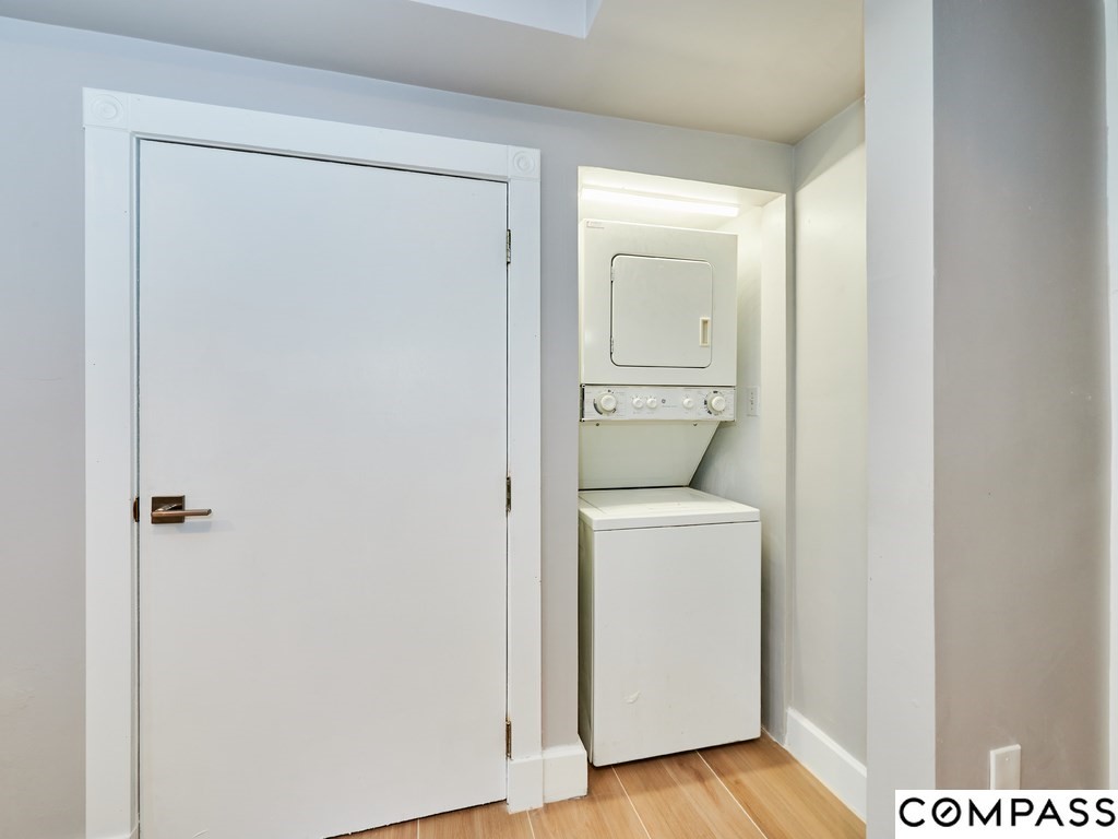 145 Pearl Street, Unit 145 Cambridge, MA 02139 - Photo 23 of 26 a view of bathroom with a washer and dryer