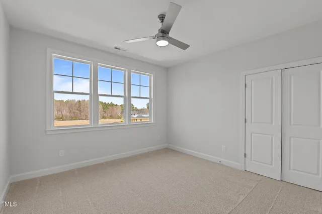a bathroom with a bathtub and a toilet