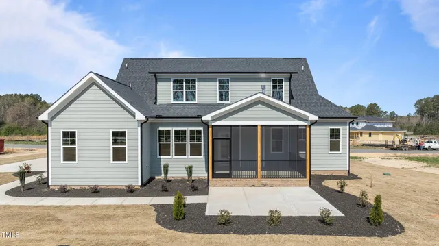 a view of a house with a ocean view