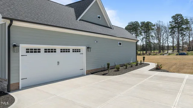 a view of a swimming pool and a yard