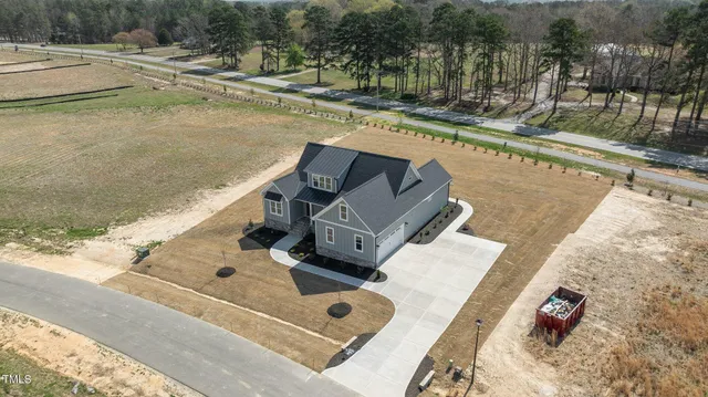 a bed room with a bed and a night stand