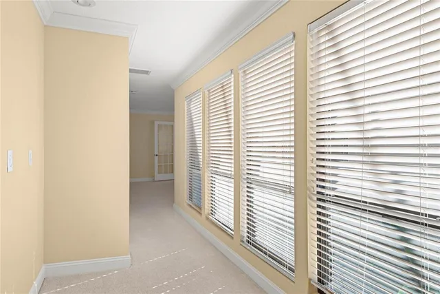 a view of a room with a large window