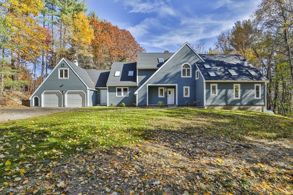 72 Ayer Road Harvard, MA 01451 - Photo 1 of 38 a front view of a house with garden