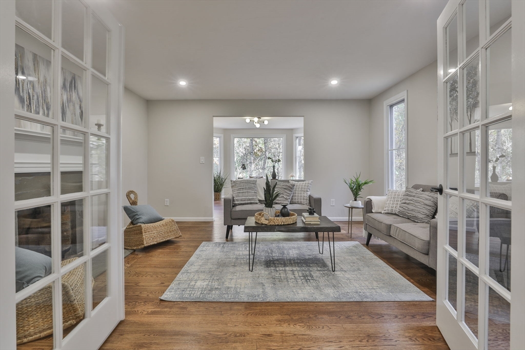 72 Ayer Road Harvard, MA 01451 - Photo 13 of 38 a living room with furniture and a large window