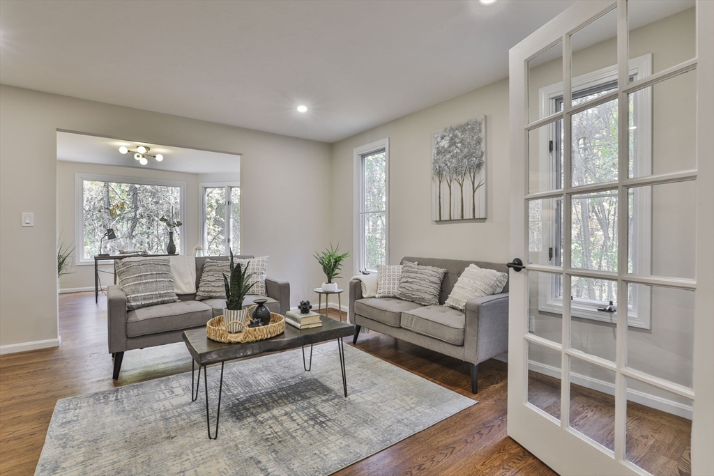 72 Ayer Road Harvard, MA 01451 - Photo 14 of 38 a living room with furniture a rug and a large window