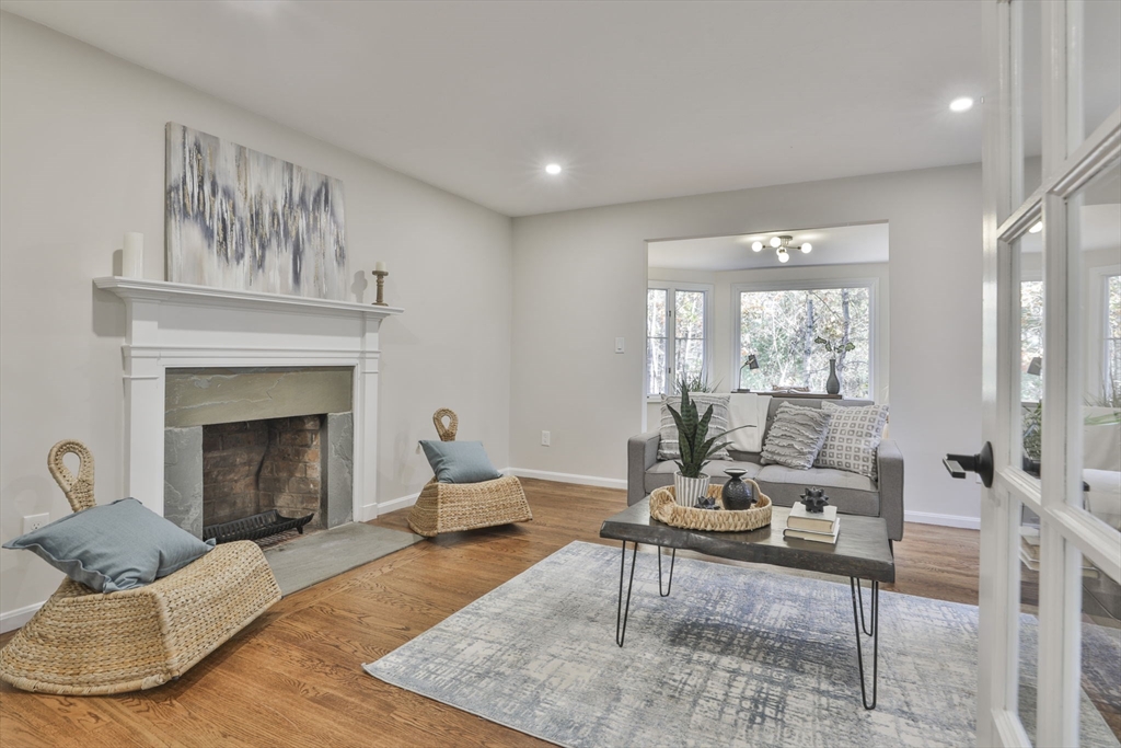 72 Ayer Road Harvard, MA 01451 - Photo 15 of 38 a living room with furniture and a fireplace