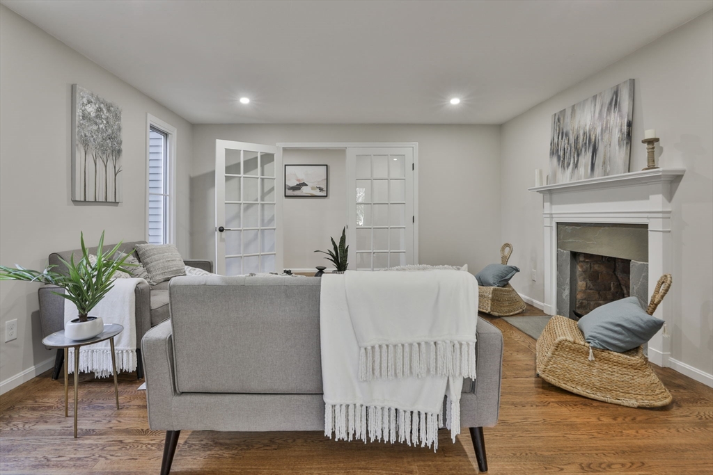 72 Ayer Road Harvard, MA 01451 - Photo 17 of 38 a living room with furniture and a fireplace
