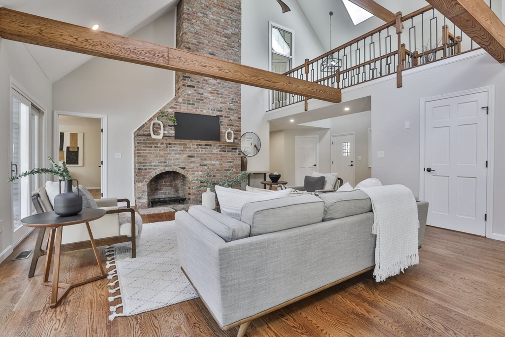 72 Ayer Road Harvard, MA 01451 - Photo 3 of 38 a living room with furniture and a fireplace