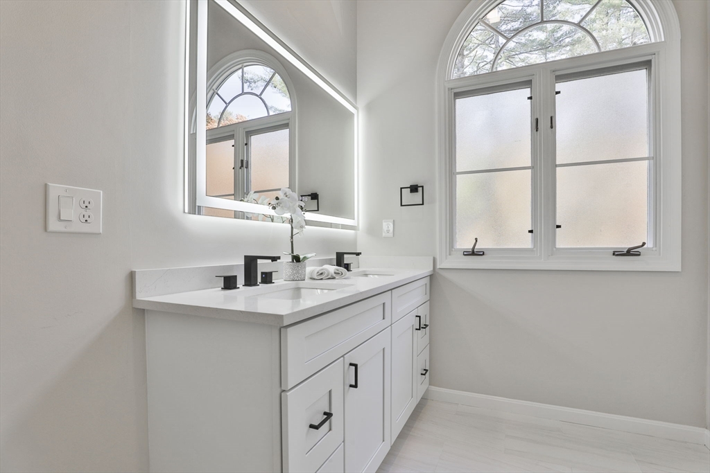 72 Ayer Road Harvard, MA 01451 - Photo 31 of 38 a bathroom with a sink and a mirror