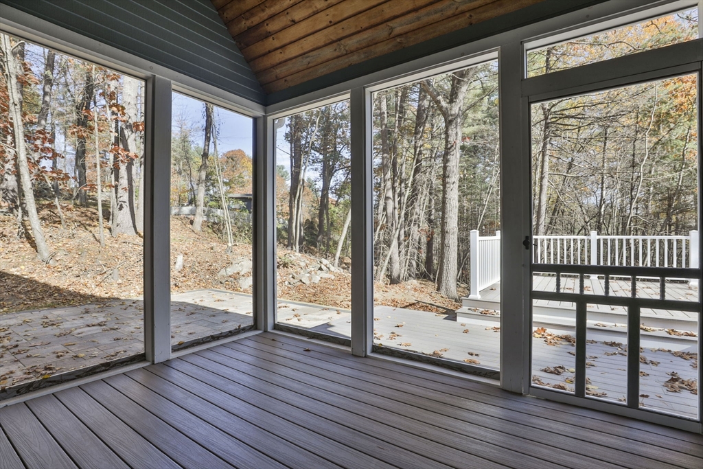 72 Ayer Road Harvard, MA 01451 - Photo 34 of 38 a view of a room with wooden floor and wooden floor
