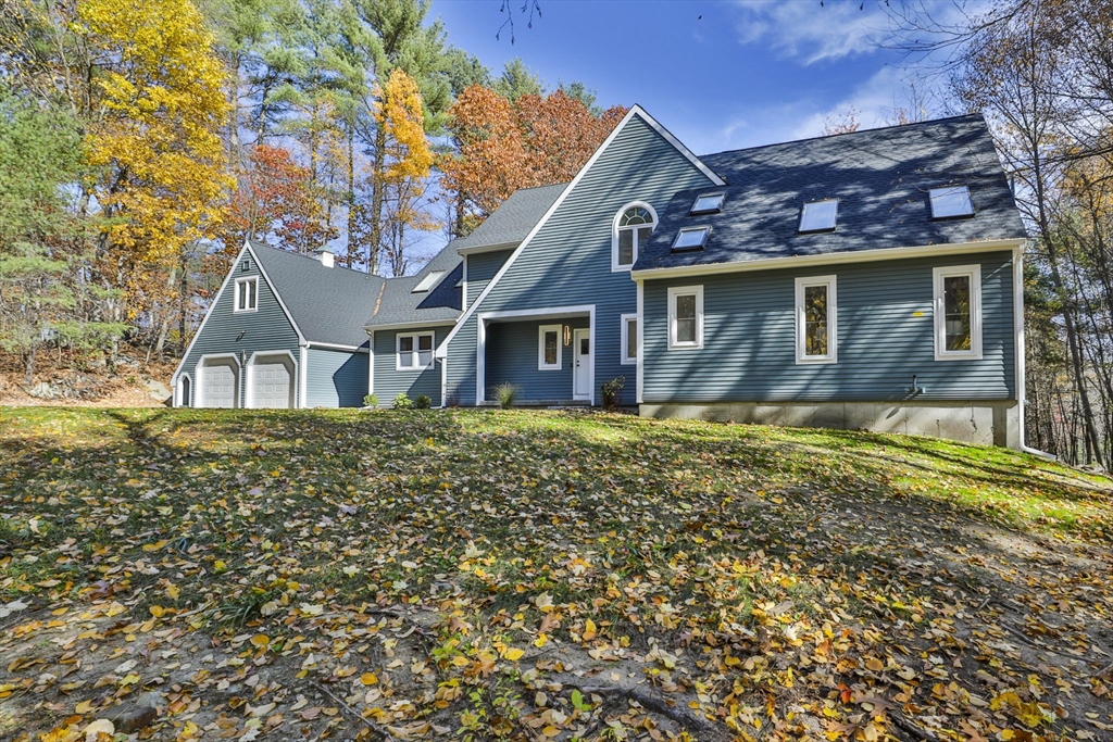 72 Ayer Road Harvard, MA 01451 - Photo 38 of 38 front view of house with a yard