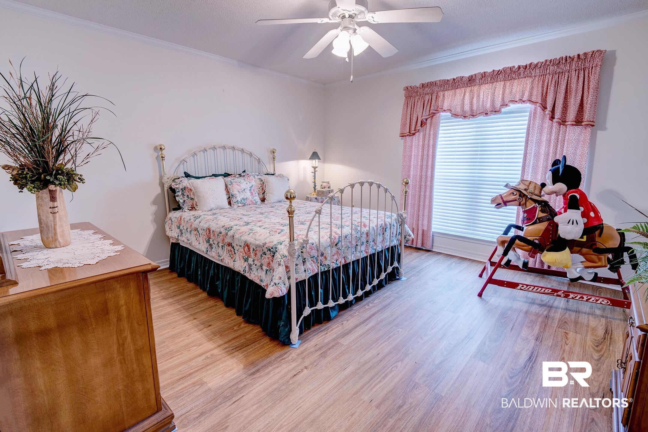 12626 Hunters Chase Foley, AL 36535 - Photo 25 of 40 Bedroom featuring wood finished floors, a ceiling fan, and crown molding