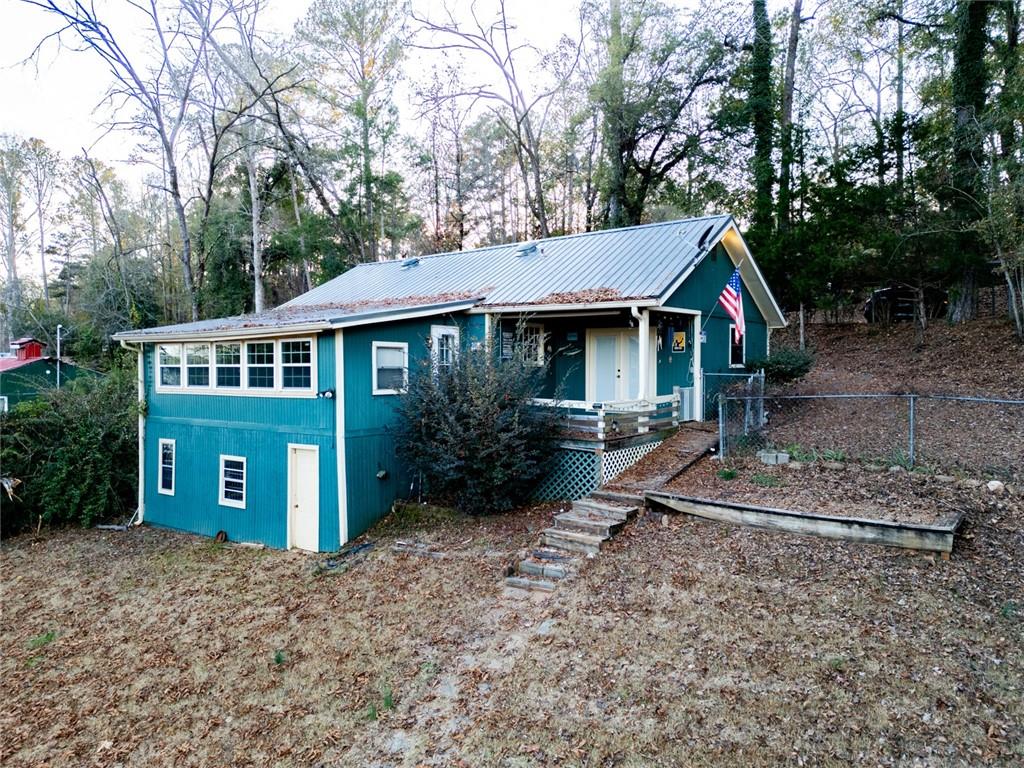 458 Haley Road Jackson, GA 30233 - Photo 2 of 58 a view of a house with a yard patio and a trees