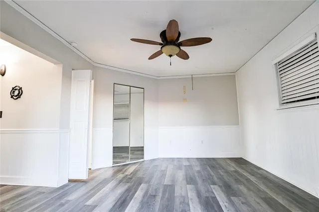 a view of a lake with a house in the background