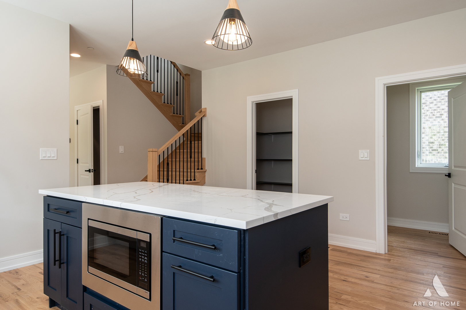 7957 West 73rd Place Bridgeview, IL 60455 - Photo 14 of 40 a view of kitchen island with wooden floor