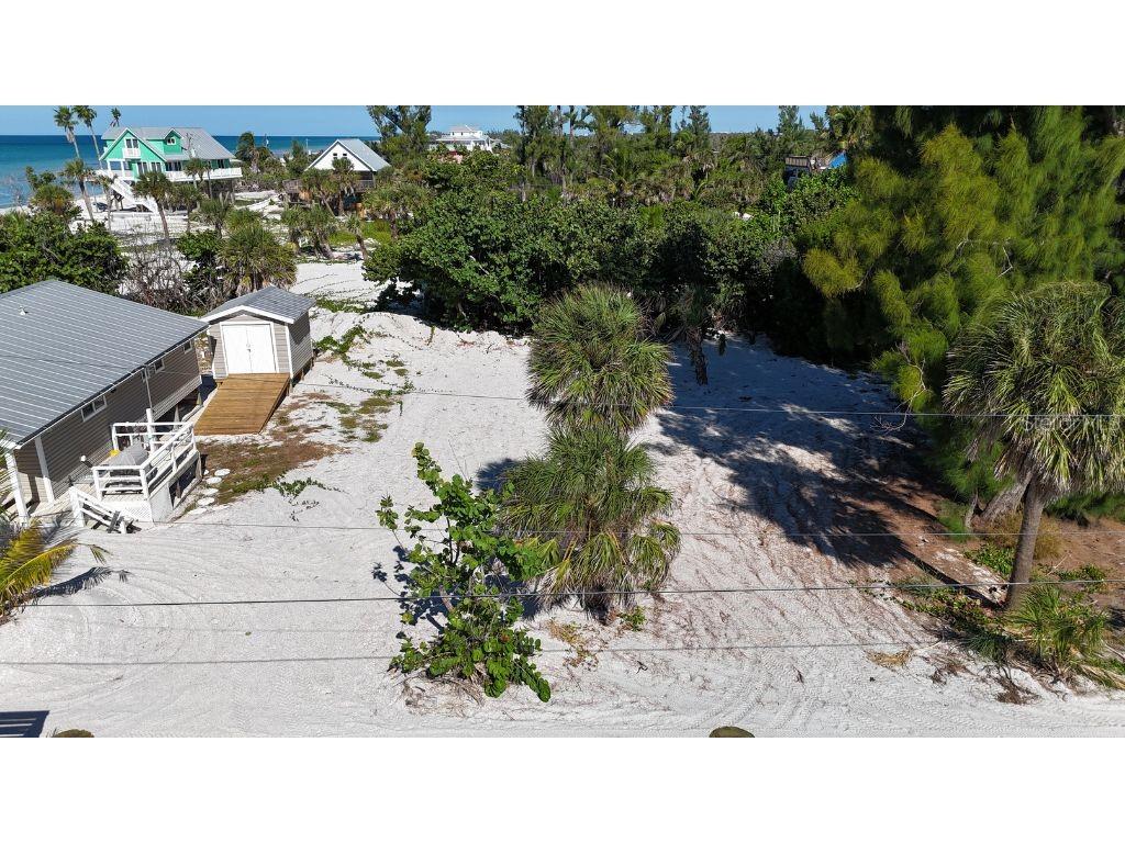 8306 Little Gasparilla Boca Grande, FL 33921 - Photo 11 of 17 a black and white photo of a building