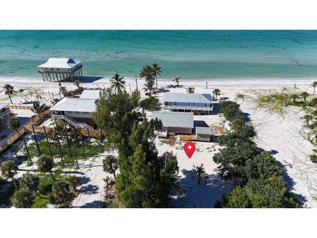8306 Little Gasparilla Boca Grande, FL 33921 - Photo 3 of 17 a picture of city view with lake view