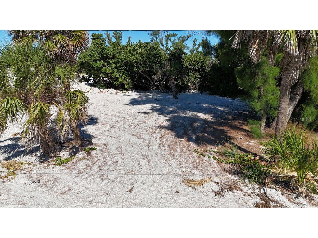8306 Little Gasparilla Boca Grande, FL 33921 - Photo 7 of 17 a view of a backyard