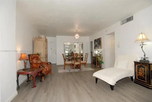 a living room with furniture and a couch