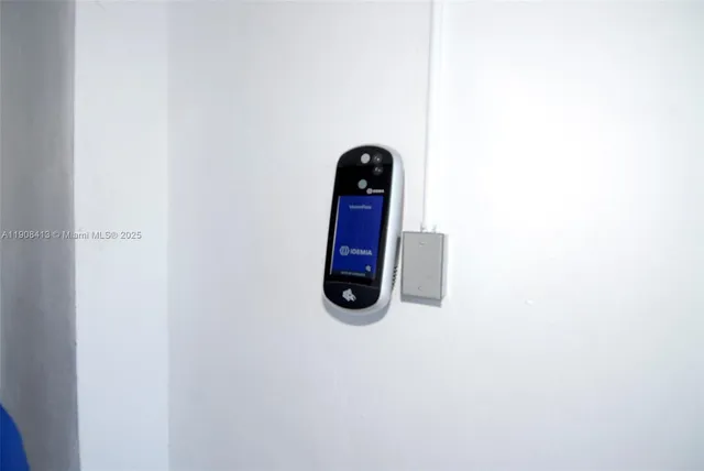 a view of a workspace with furniture and wooden floor