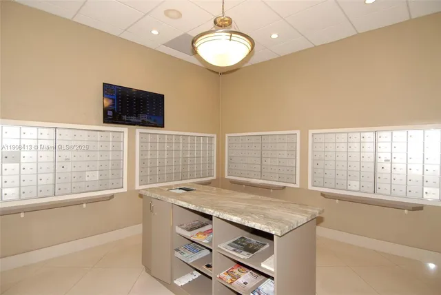 a view of workspace with a flat screen tv