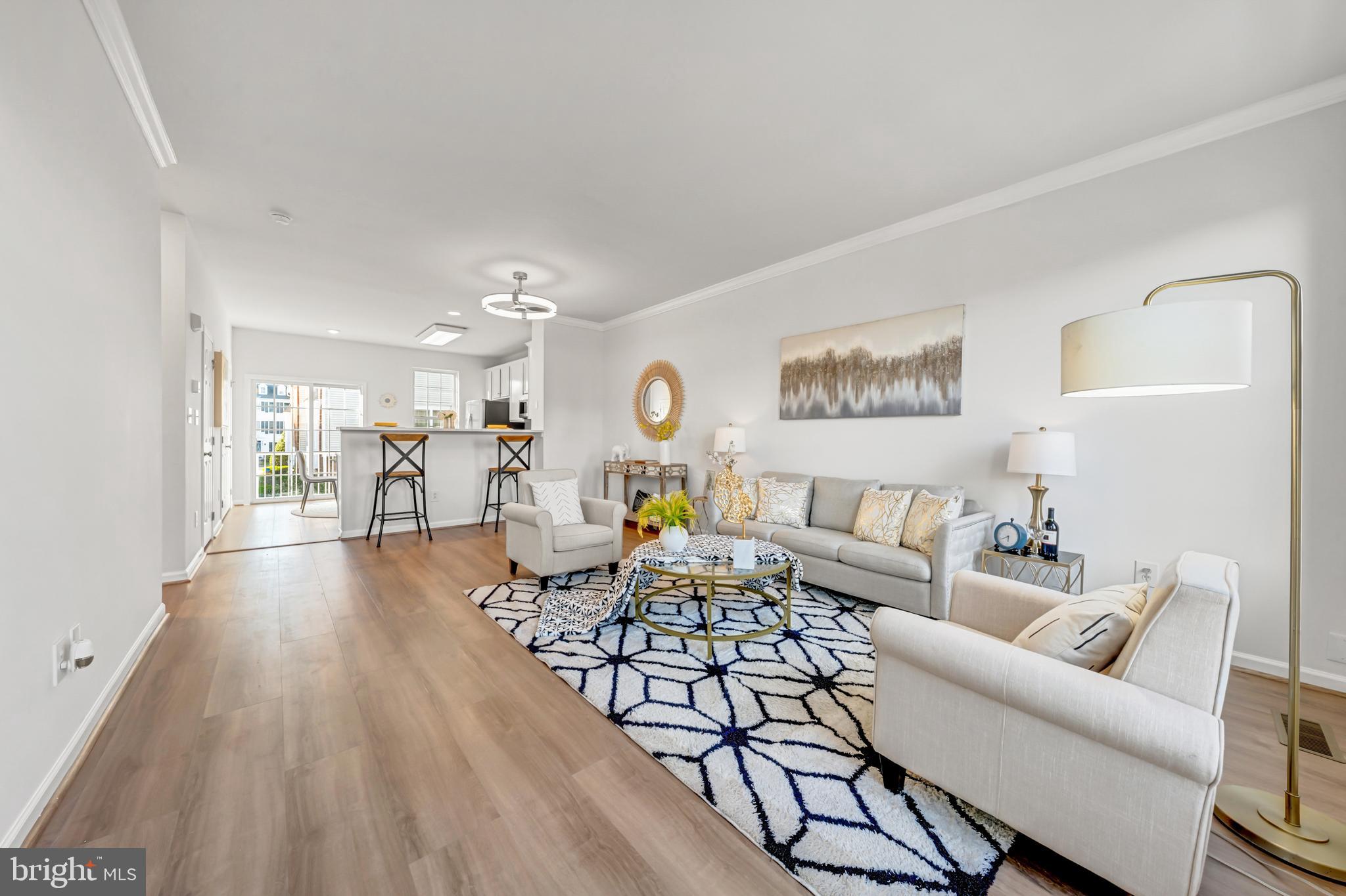 42790 Nations Street Chantilly, VA 20152 - Photo 12 of 40 a living room with furniture and a wooden floor