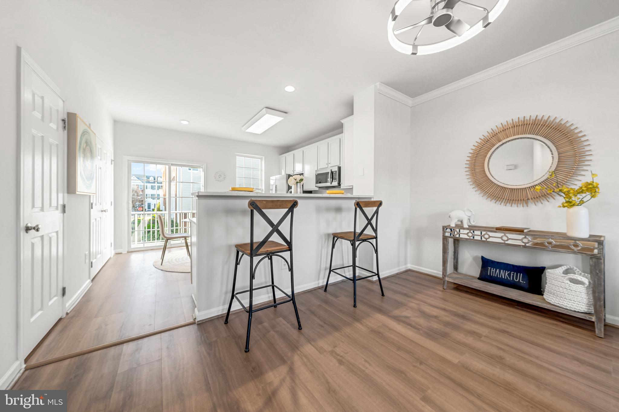 42790 Nations Street Chantilly, VA 20152 - Photo 20 of 40 a view of a livingroom with furniture and a fireplace