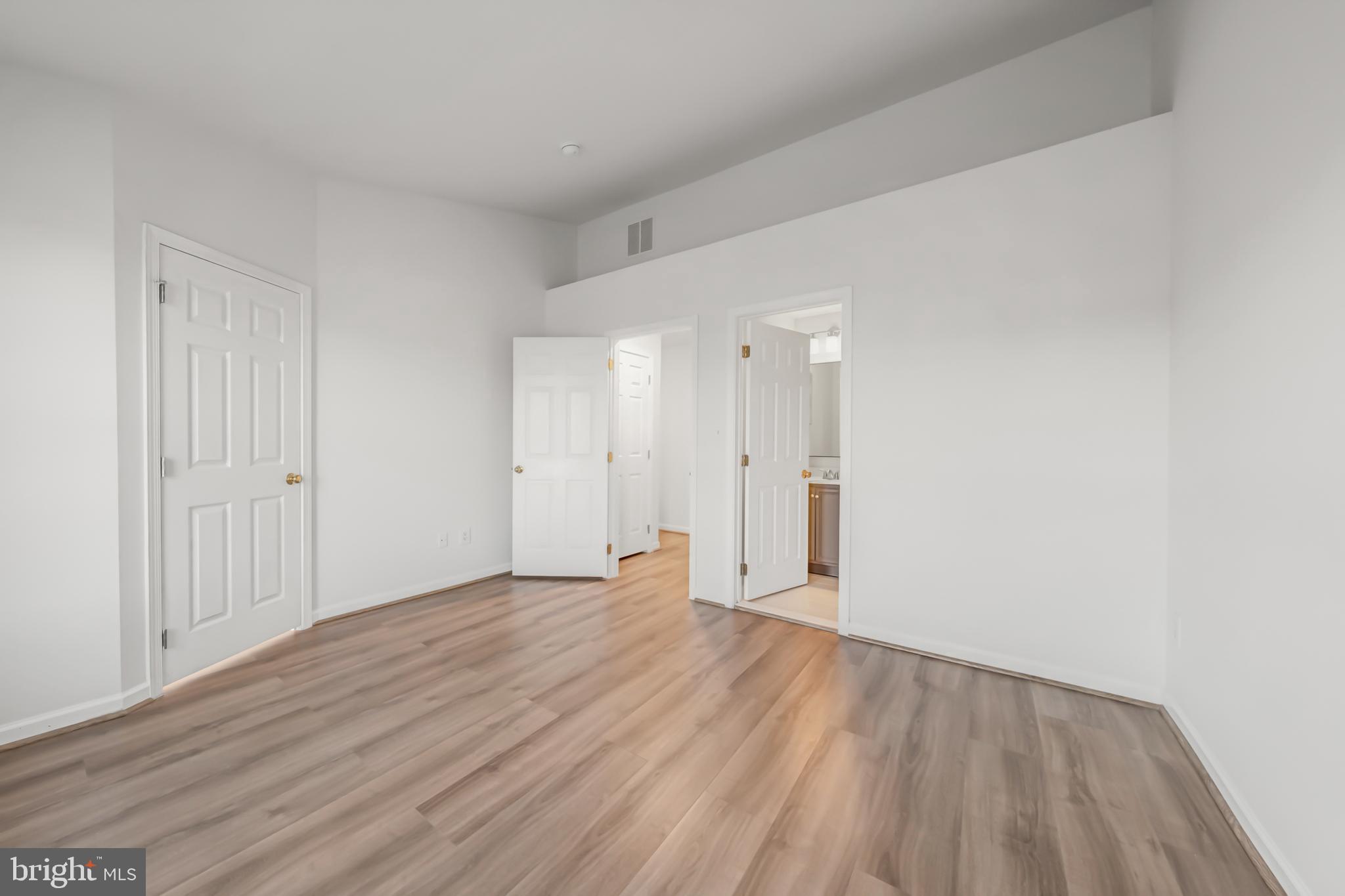 42790 Nations Street Chantilly, VA 20152 - Photo 29 of 40 a view of an empty room and wooden floor