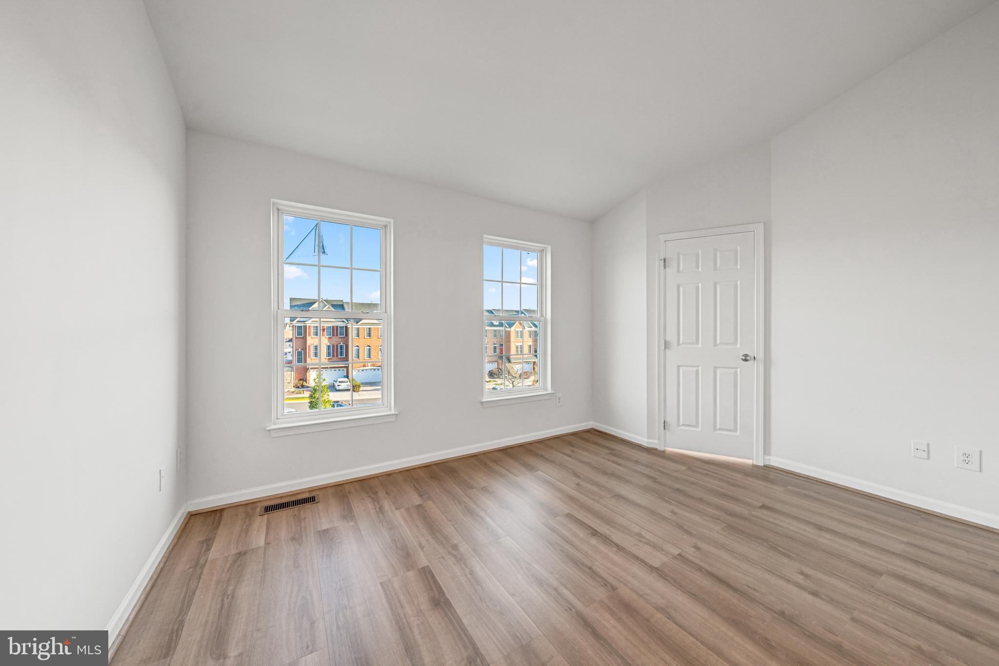42790 Nations Street Chantilly, VA 20152 - Photo 30 of 40 an empty room with wooden floor and windows