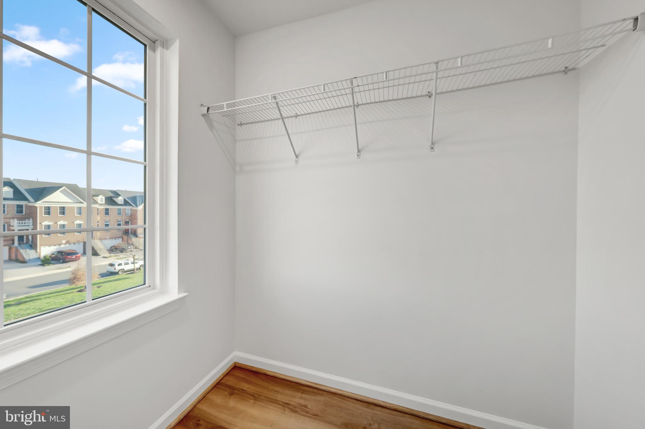 42790 Nations Street Chantilly, VA 20152 - Photo 31 of 40 a view of a small space with racks on the wall