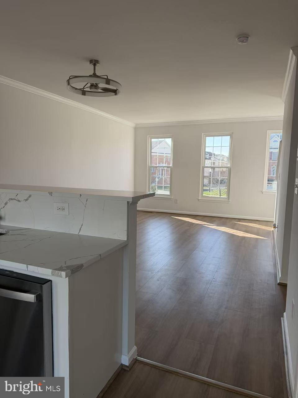 42790 Nations Street Chantilly, VA 20152 - Photo 6 of 40 an empty room with windows and ceiling fan
