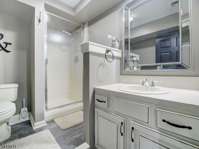 23 Ryerson Road Flemington, NJ 08822 - Photo 31 of 44 a bathroom with a sink and a mirror