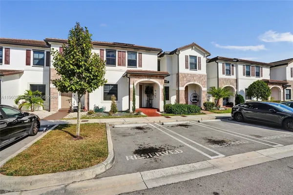 front view of a house with a small yard