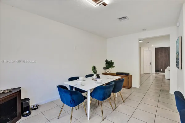 a view of a dining room with furniture