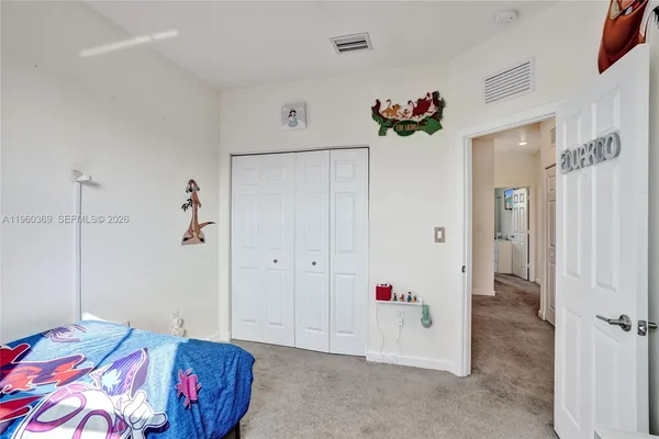 a bedroom with lots of baby toys