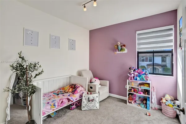 a living room with furniture and window