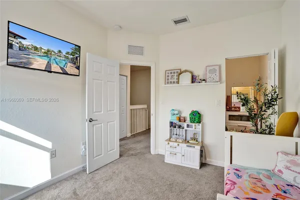 a view of hallway with livingroom