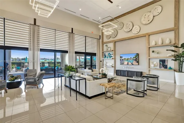 a view of swimming pool with outdoor seating and lake view