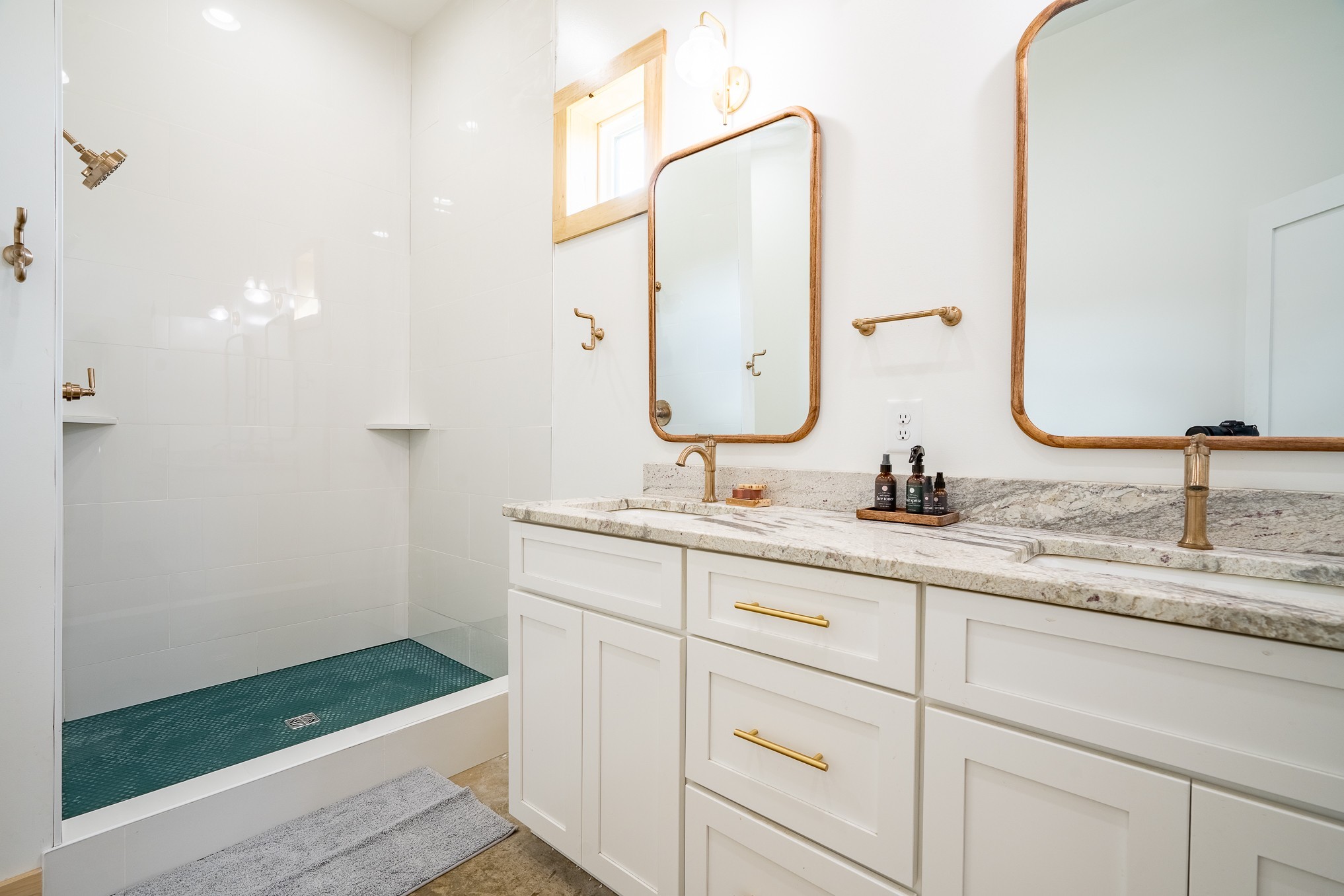 125 Ashland Road Waynesboro, TN 38485 - Photo 10 of 92 a bathroom with a double vanity sink and a mirror