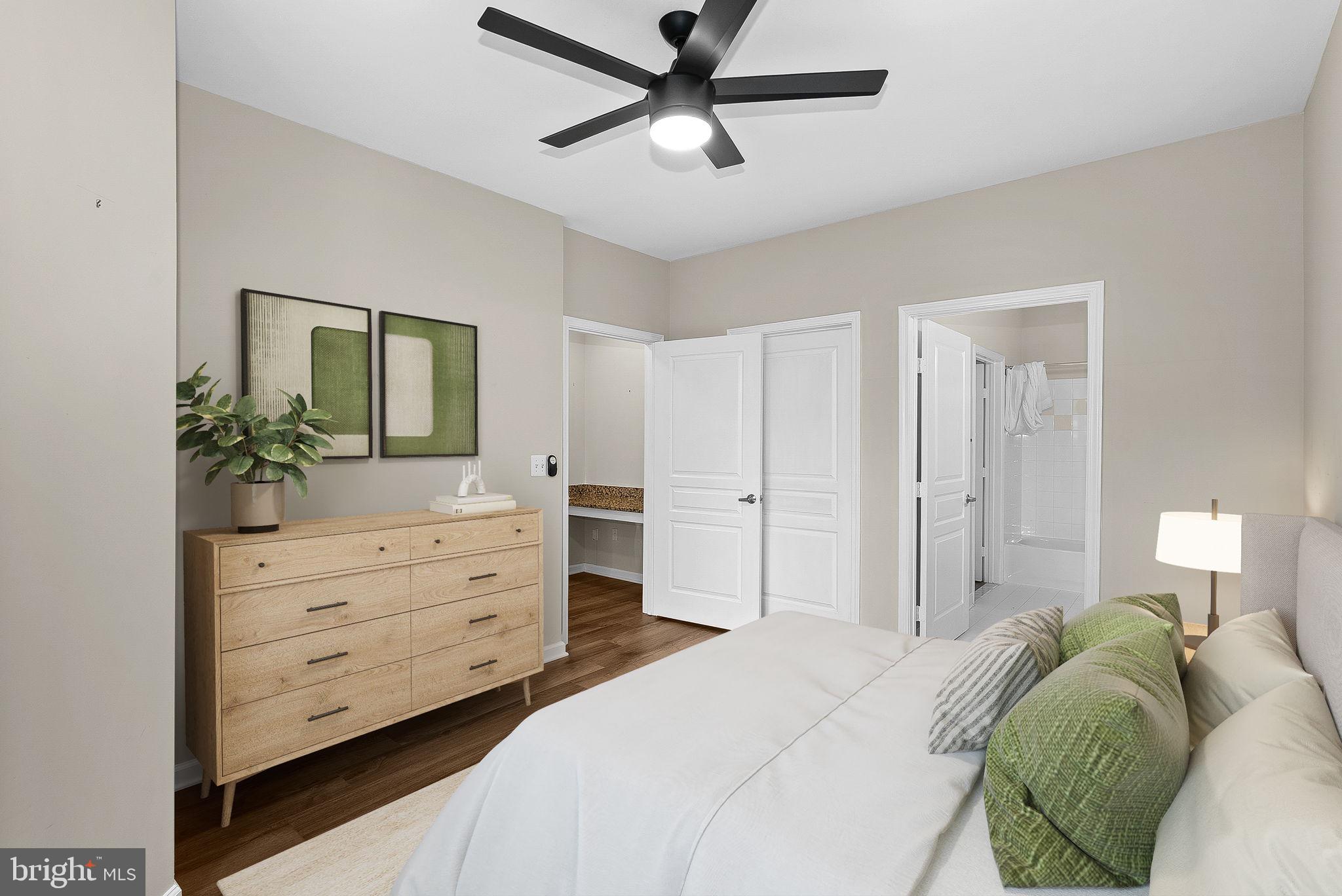12000 Market Street, Unit 329 Reston, VA 20190 - Photo 27 of 56 Serene bedroom with modern accents.