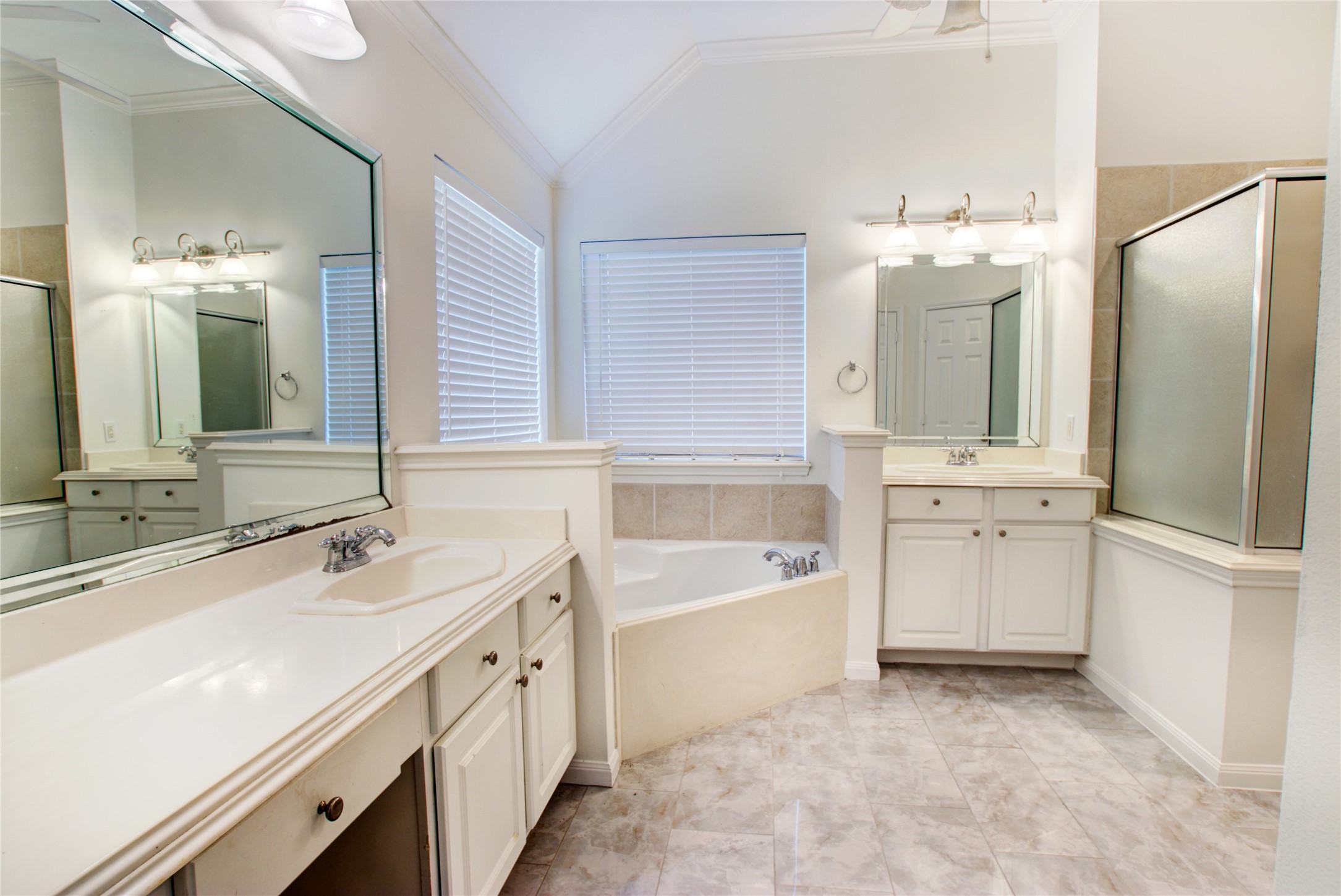 3327 River Bend Drive Rosenberg, TX 77471 - Photo 17 of 33 a bathroom with a double vanity sink mirror and bathtub