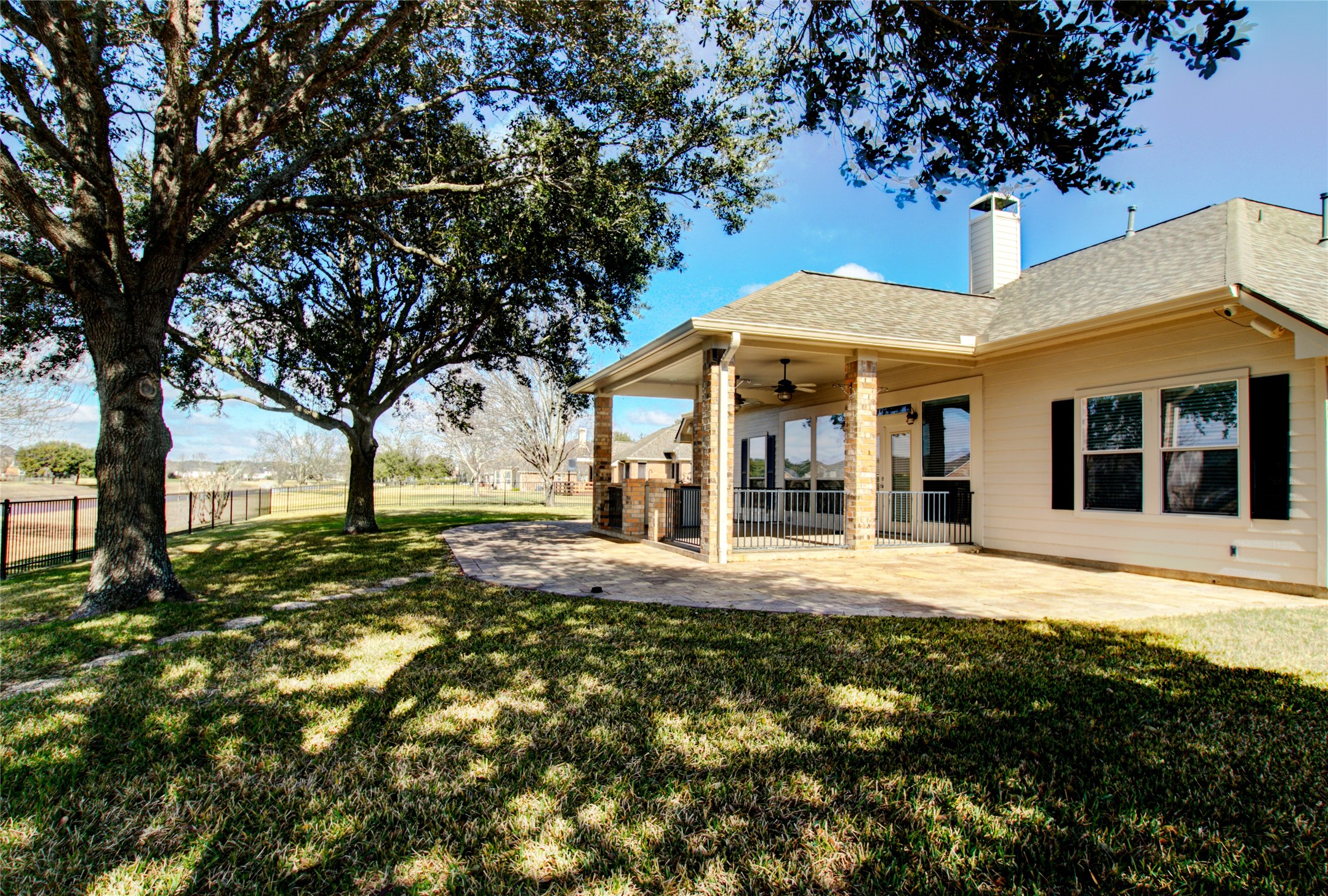 3327 River Bend Drive Rosenberg, TX 77471 - Photo 31 of 33 a front view of a house with a garden