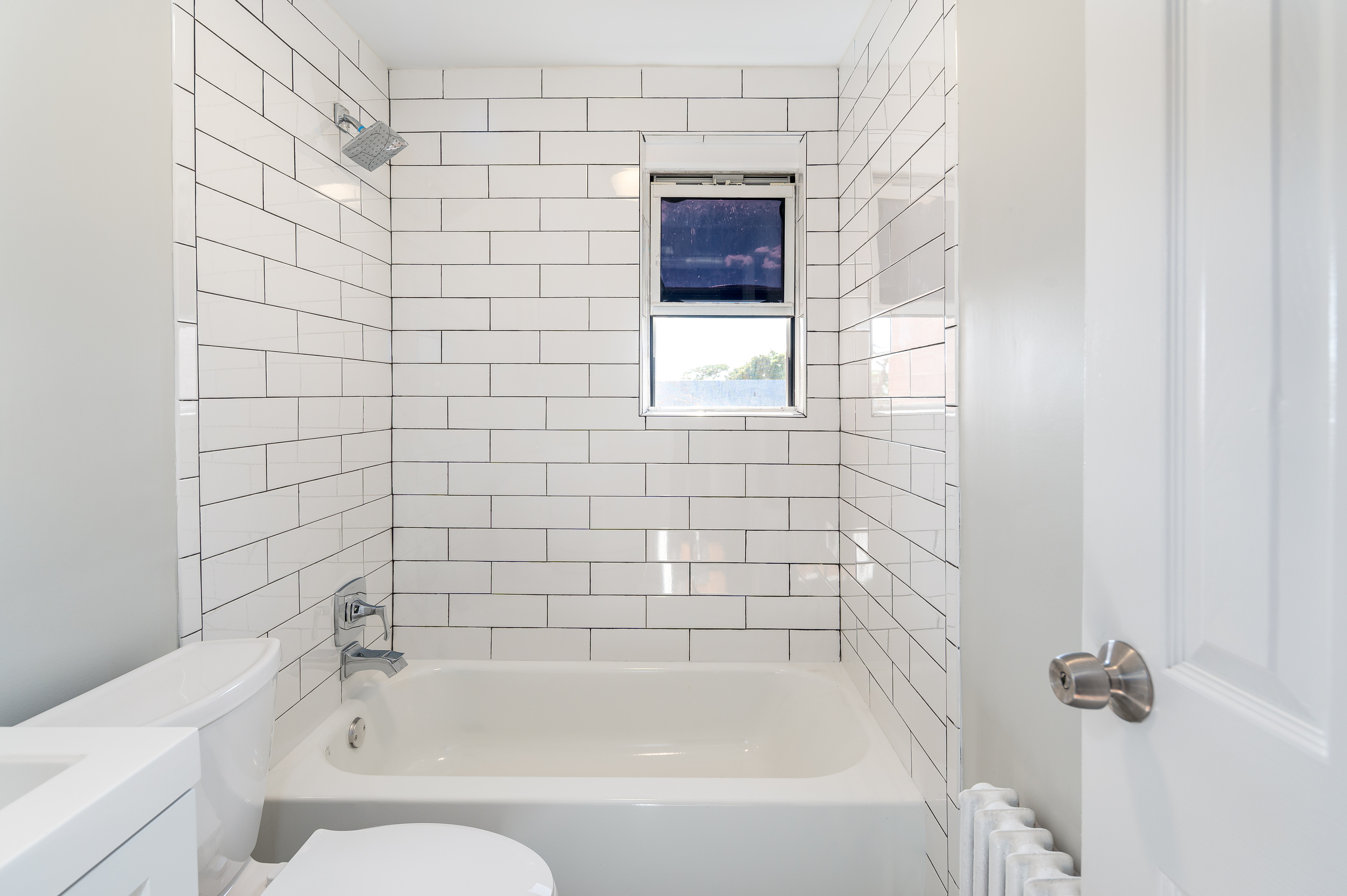 23 Standish Road, Unit 2 Stamford, CT 06902 - Photo 14 of 27 a bathroom with a bathtub and shower